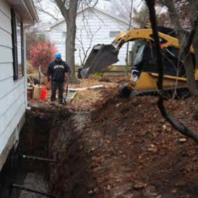 Helical Tiebacks Installed for a Failed Foundation Wall | KC Waterproofing